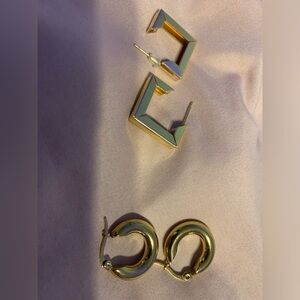 Two sets of earrings